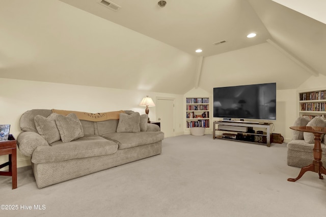 7102 Saybrook Dr, Wilmington, NC 28405 - living room with lofted ceiling, carpet floors, recessed lighting, and built in features