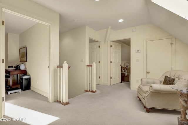 7102 Saybrook Dr, Wilmington, NC 28405 - living area featuring an upstairs landing, light colored carpet, vaulted ceiling, and recessed lighting