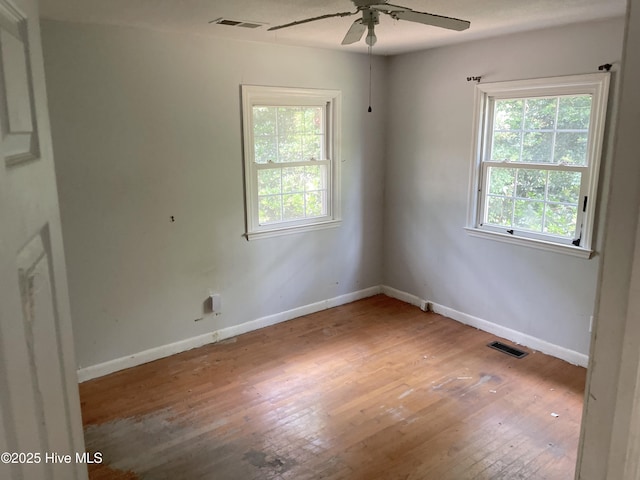 119 Riverside Dr, Havelock, NC 28532 - empty room featuring ceiling fan, hardwood / wood-style flooring, and baseboards