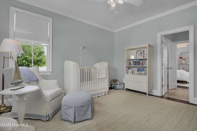 6221 Chalfont Cir, Wilmington, NC 28405 - carpeted bedroom featuring a ceiling fan, baseboards, and ornamental molding
