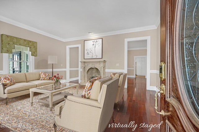 114 N Atlantic Ave, Southport, NC 28461 - living area with crown molding, dark wood finished floors, a fireplace, and baseboards