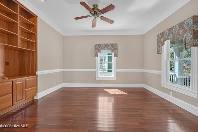 114 N Atlantic Ave, Southport, NC 28461 - unfurnished room with healthy amount of natural light, a ceiling fan, dark wood-style flooring, crown molding, and baseboards