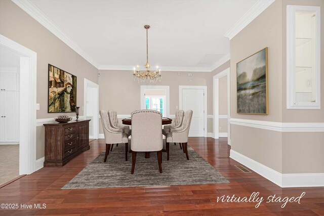114 N Atlantic Ave, Southport, NC 28461 - dining room featuring a chandelier, dark wood-type flooring, crown molding, and baseboards