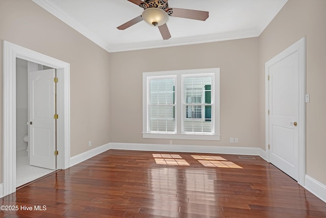 114 N Atlantic Ave, Southport, NC 28461 - spare room with wood-type flooring, a ceiling fan, crown molding, and baseboards