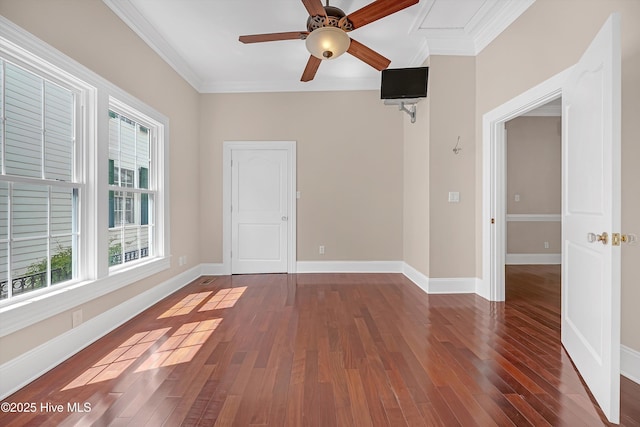 114 N Atlantic Ave, Southport, NC 28461 - spare room with ornamental molding, a ceiling fan, hardwood / wood-style floors, and baseboards