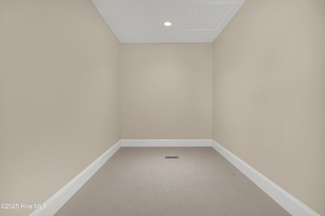 114 N Atlantic Ave, Southport, NC 28461 - unfurnished room featuring light carpet, baseboards, recessed lighting, and attic access