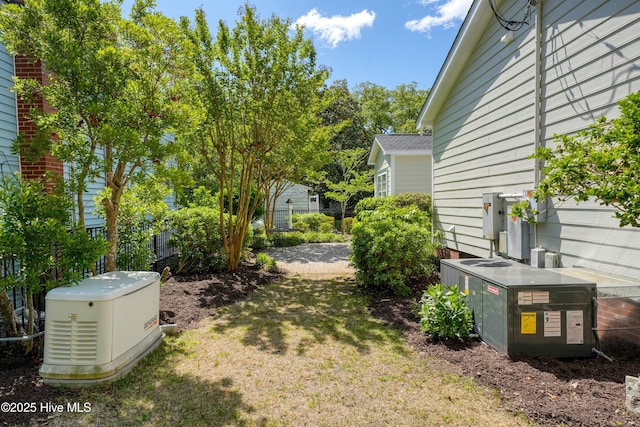 114 N Atlantic Ave, Southport, NC 28461 - view of green lawn featuring cooling unit