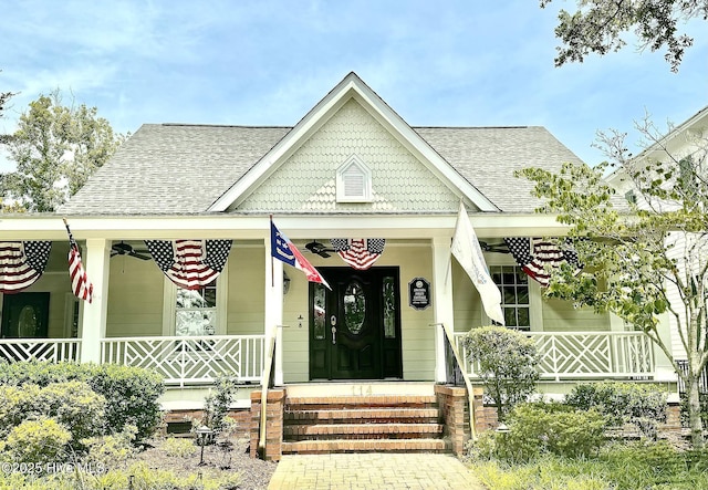 114 N Atlantic Ave, Southport, NC 28461 - view of front of house featuring a porch and a shingled roof