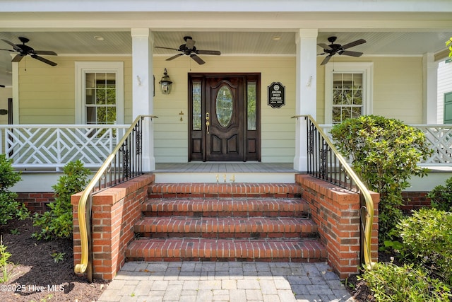 114 N Atlantic Ave, Southport, NC 28461 - doorway to property with a ceiling fan and covered porch