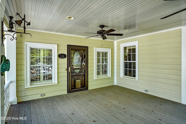 114 N Atlantic Ave, Southport, NC 28461 - wooden deck with a ceiling fan