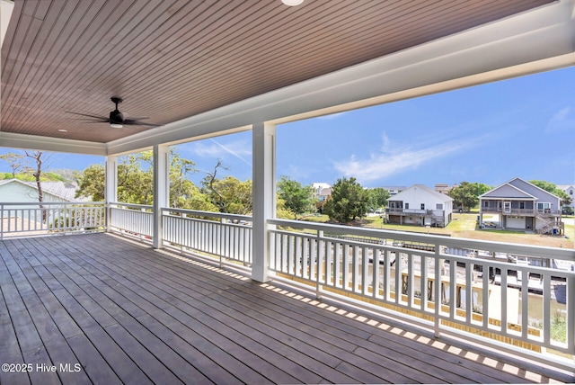 110 SW 26th St, Oak Island, NC 28465 - deck with a residential view and ceiling fan