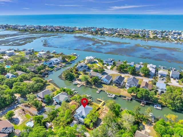 110 SW 26th St, Oak Island, NC 28465 - aerial view featuring a water view and a residential view