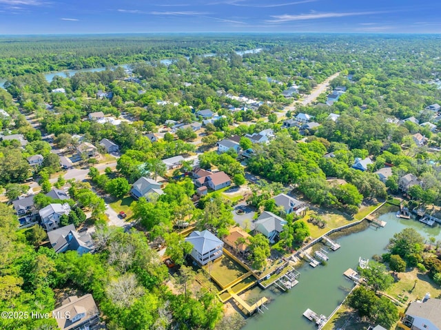 110 SW 26th St, Oak Island, NC 28465 - birds eye view of property with a water view, a view of trees, and a residential view