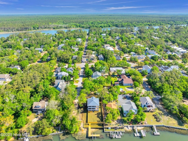 110 SW 26th St, Oak Island, NC 28465 - drone / aerial view featuring a residential view, a water view, and a wooded view
