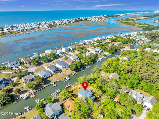 110 SW 26th St, Oak Island, NC 28465 - birds eye view of property with a residential view and a water view