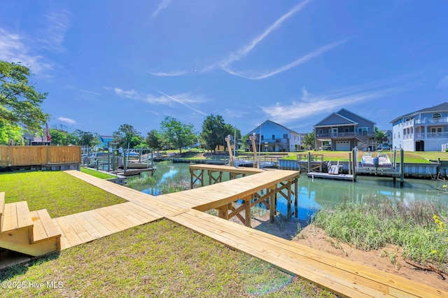 110 SW 26th St, Oak Island, NC 28465 - view of dock featuring a water view and a yard
