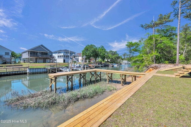 110 SW 26th St, Oak Island, NC 28465 - view of dock with a water view