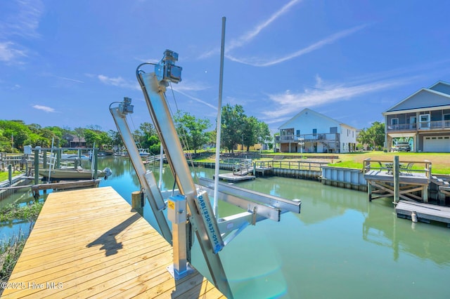 110 SW 26th St, Oak Island, NC 28465 - dock area with boat lift and a water view