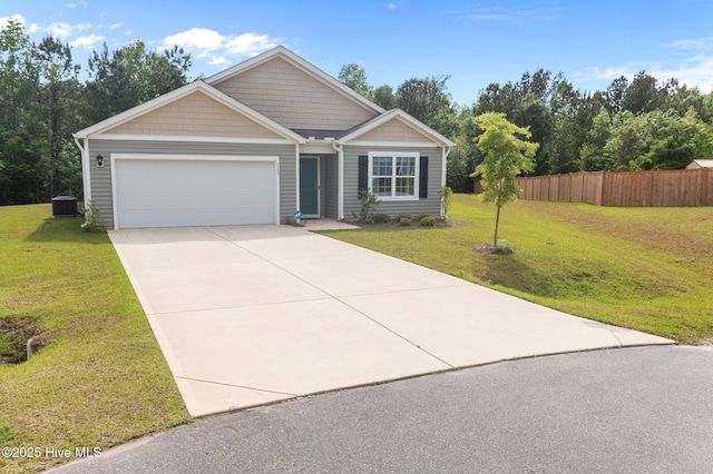 view of front of home featuring a front lawn, a garage, cooling unit, concrete driveway, and fence