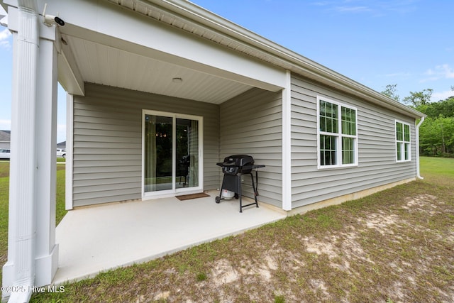 back of house with a patio