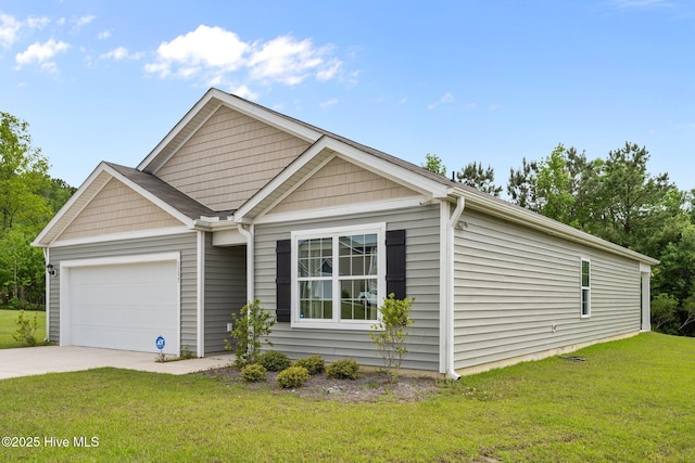 view of front facade featuring driveway, a front yard, and an attached garage