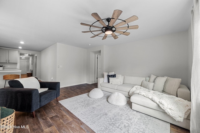 living area featuring ceiling fan, recessed lighting, dark wood finished floors, and baseboards