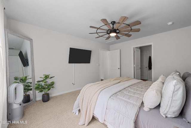 carpeted bedroom featuring visible vents, ceiling fan, and baseboards