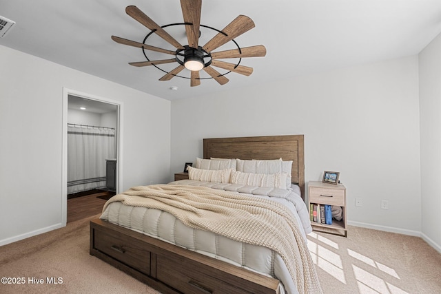 bedroom with light colored carpet, a ceiling fan, and baseboards