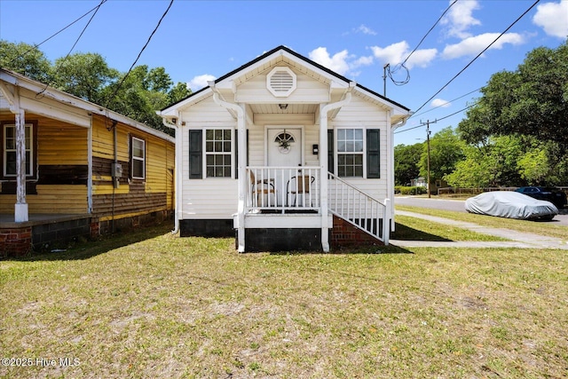 1202 S 8th St, Wilmington, NC 28401 - view of front of home featuring a front lawn