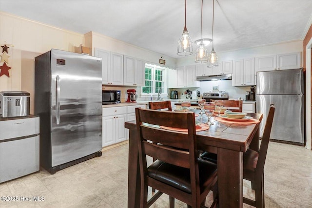 720 Swains Mill Rd, Harrellsville, NC 27942 - dining room with light flooring