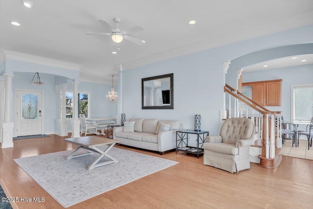 3720 Island Dr, North Topsail Beach, NC 28460 - living room featuring ceiling fan, arched walkways, light wood-style flooring, recessed lighting, and decorative columns