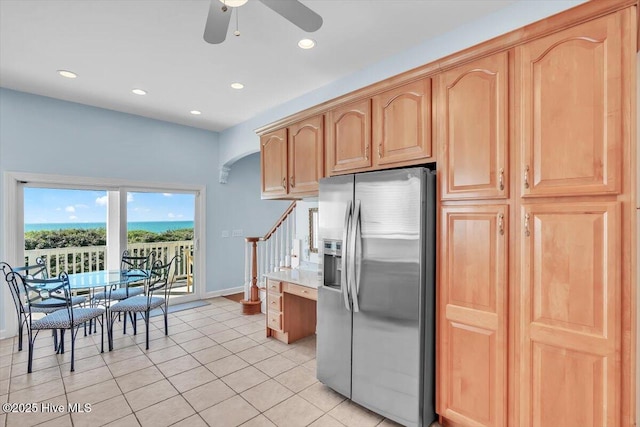 3720 Island Dr, North Topsail Beach, NC 28460 - kitchen featuring stainless steel fridge, arched walkways, a ceiling fan, recessed lighting, and light tile patterned floors