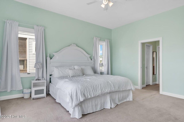 3720 Island Dr, North Topsail Beach, NC 28460 - carpeted bedroom featuring baseboards and ceiling fan