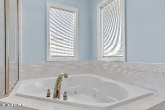 3720 Island Dr, North Topsail Beach, NC 28460 - bathroom featuring a tub with jets