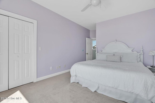 3720 Island Dr, North Topsail Beach, NC 28460 - bedroom featuring carpet floors, ceiling fan, baseboards, and a closet
