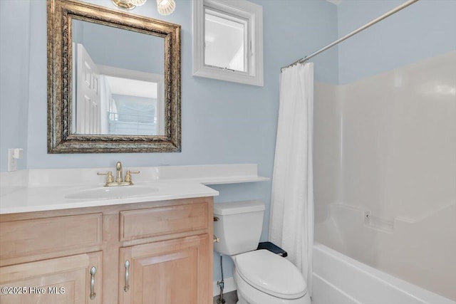 3720 Island Dr, North Topsail Beach, NC 28460 - bathroom featuring vanity, shower / bath combination with curtain, and toilet