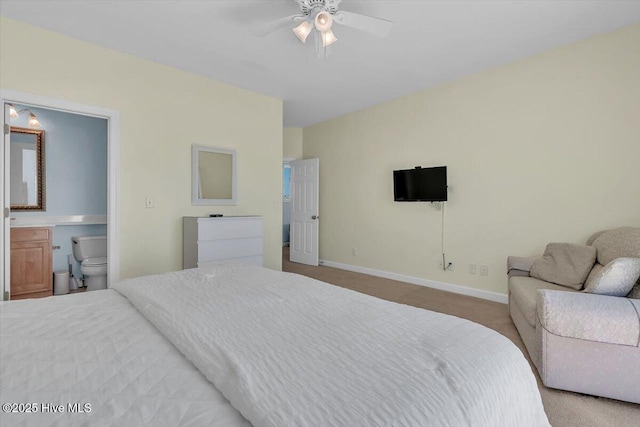 3720 Island Dr, North Topsail Beach, NC 28460 - bedroom with baseboards, carpet flooring, ensuite bathroom, and a ceiling fan