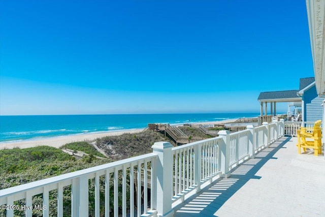 3720 Island Dr, North Topsail Beach, NC 28460 - balcony featuring a water view and a view of the beach