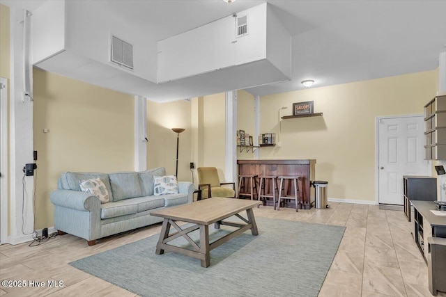 3720 Island Dr, North Topsail Beach, NC 28460 - living area with a bar and visible vents