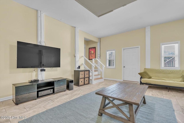 3720 Island Dr, North Topsail Beach, NC 28460 - living room with baseboards and stairway