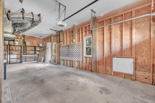 3720 Island Dr, North Topsail Beach, NC 28460 - garage featuring a garage door opener