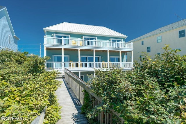 3720 Island Dr, North Topsail Beach, NC 28460 - back of house featuring a balcony and metal roof