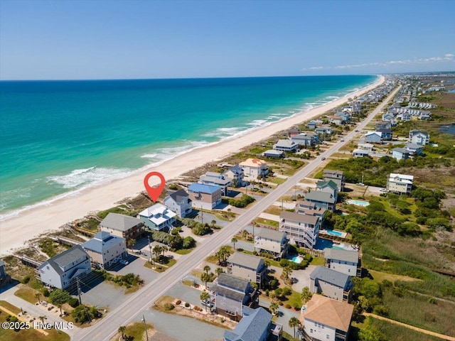 3720 Island Dr, North Topsail Beach, NC 28460 - drone / aerial view featuring a water view and a view of the beach