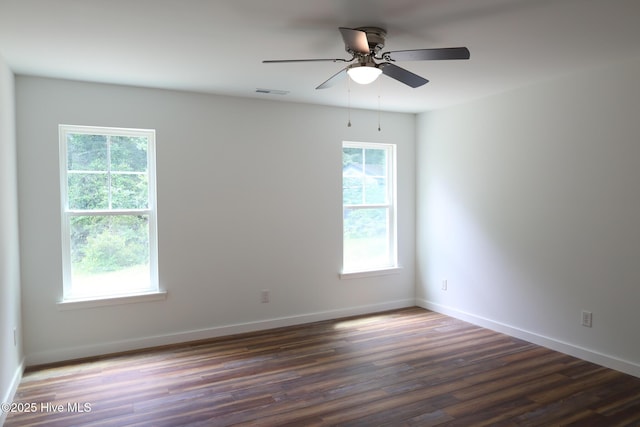 229 Spring Dr, Jacksonville, NC 28540 - empty room featuring wood finished floors, a ceiling fan, and baseboards