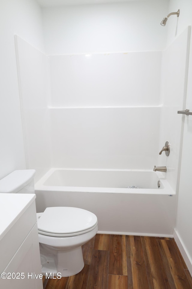 229 Spring Dr, Jacksonville, NC 28540 - full bath with toilet, wood finished floors, bathing tub / shower combination, and vanity
