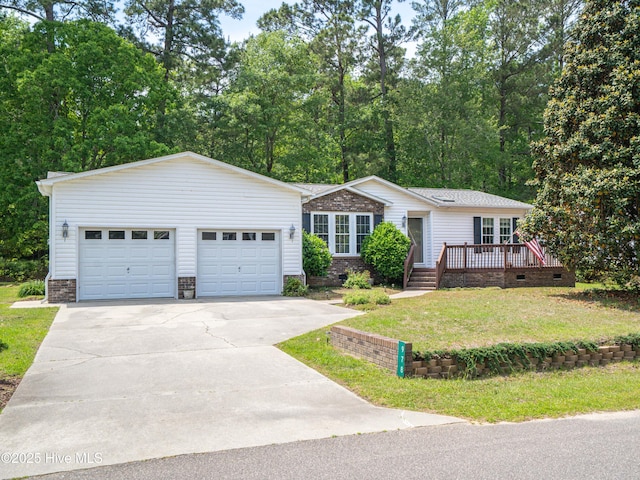 single story home featuring driveway, a deck, crawl space, a front lawn, and a garage