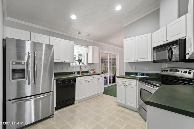 kitchen with a sink, crown molding, black appliances, dark countertops, and a textured ceiling