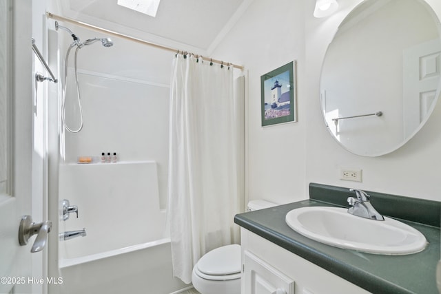 full bath with shower / bath combo, vanity, and toilet