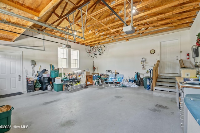garage featuring a garage door opener