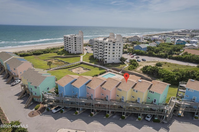 aerial view with a beach view and a water view